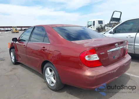 2003 Toyota Camry Le z USA, uszkodzony, nr VIN 4T1BE30KX3U205444